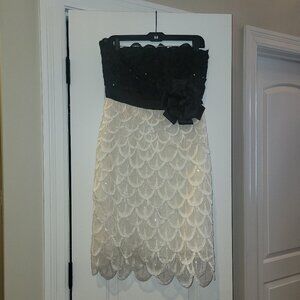 Black and white bodice style sequin peacock formal dress with bow